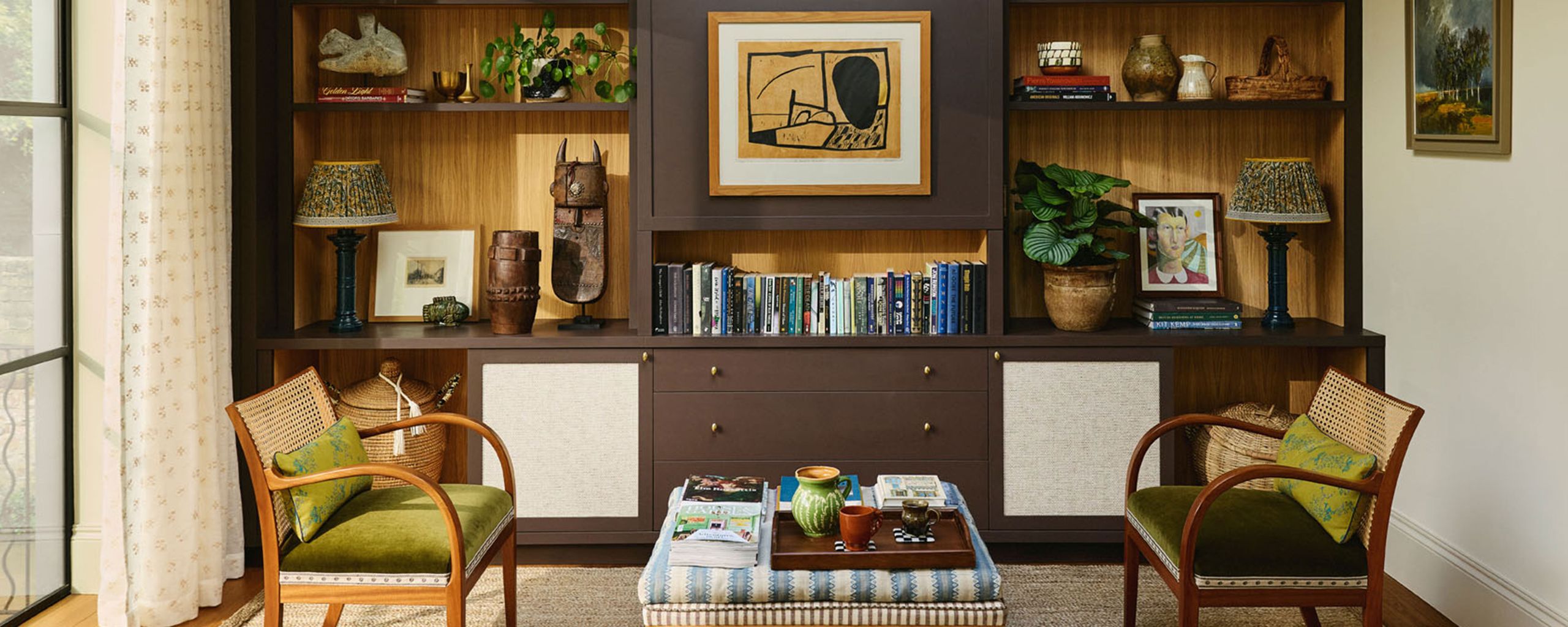 Image may contain Furniture Bookcase and Table