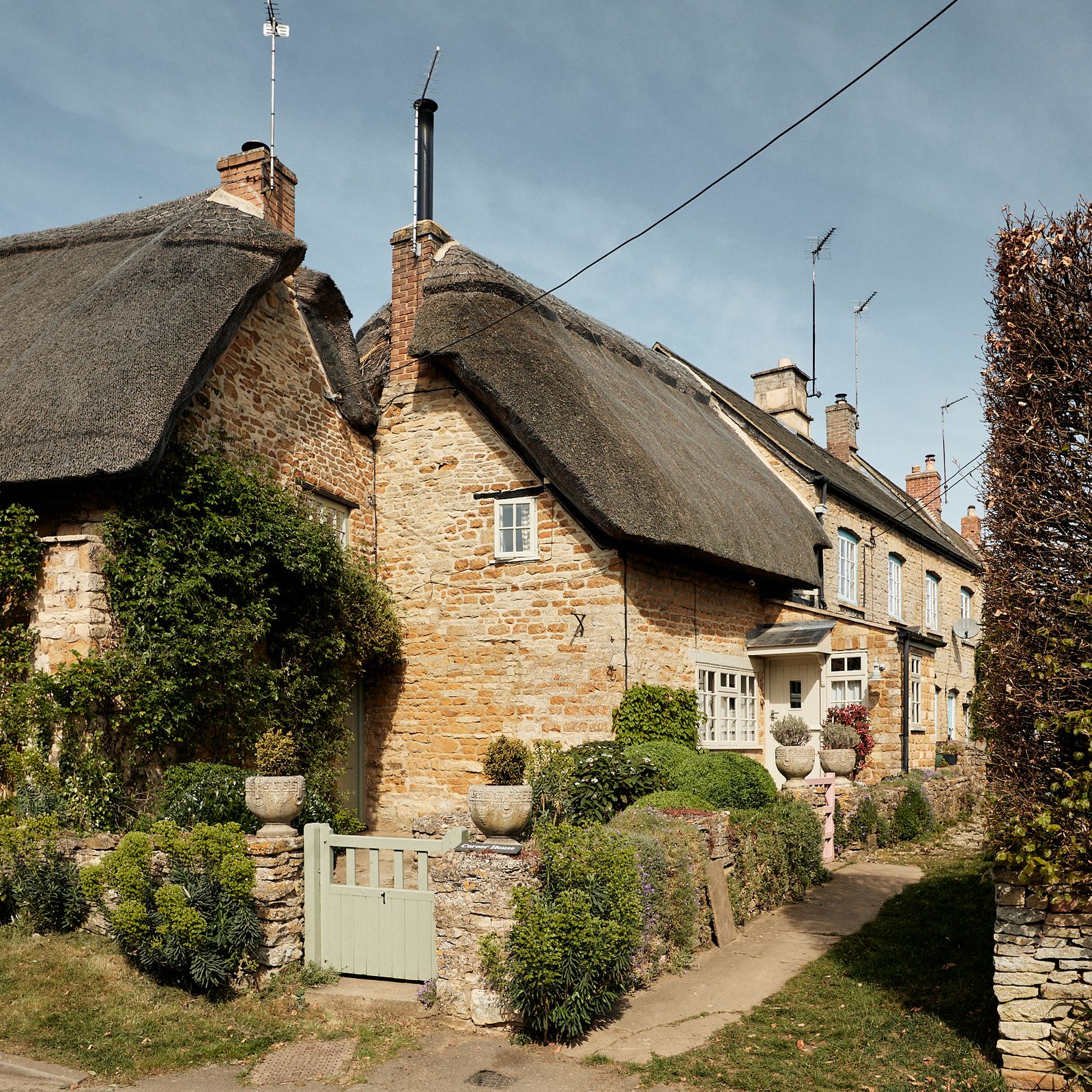 A storybook cottage in the Cotswolds lovingly layered with colour and pattern by its interior designer owner