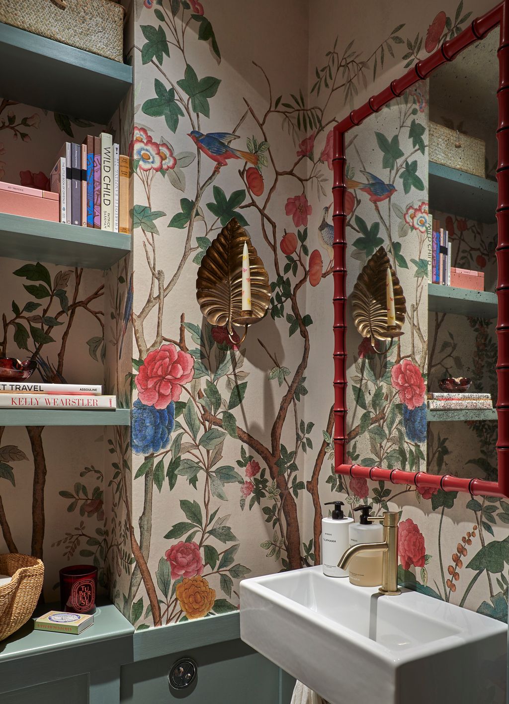 In the tiny downstairs loo of this Chelsea house by Tiffany Duggan a bold wallpaper from Gucci sits perfectly with the...