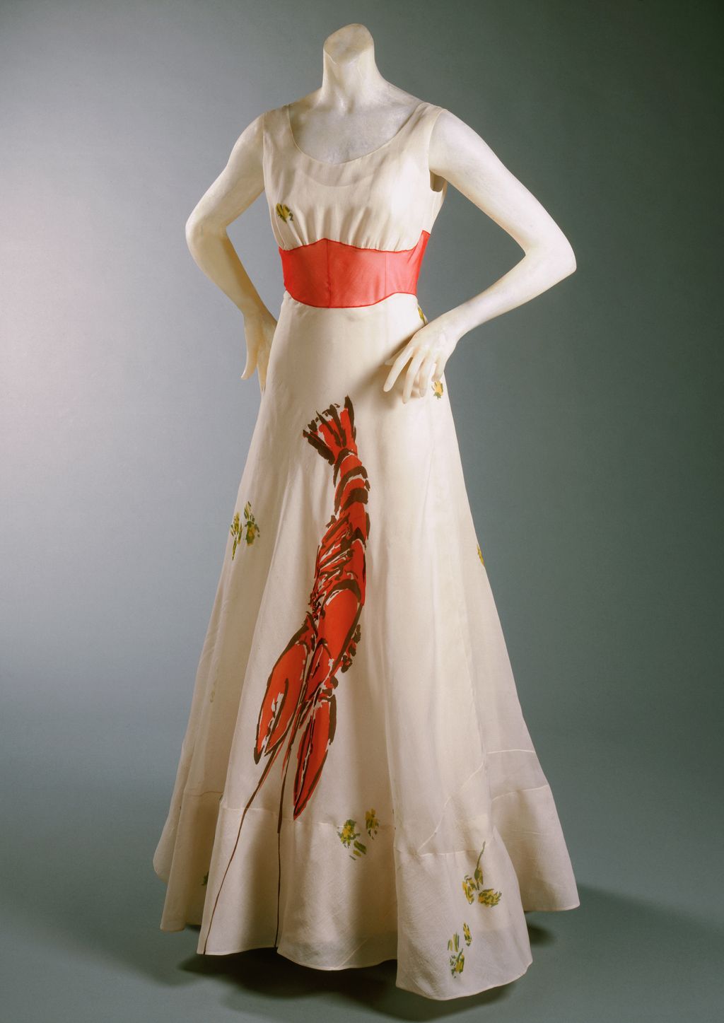 Image may contain Clothing Dress Formal Wear Evening Dress Fashion Gown Adult Person Wedding and Wedding Gown