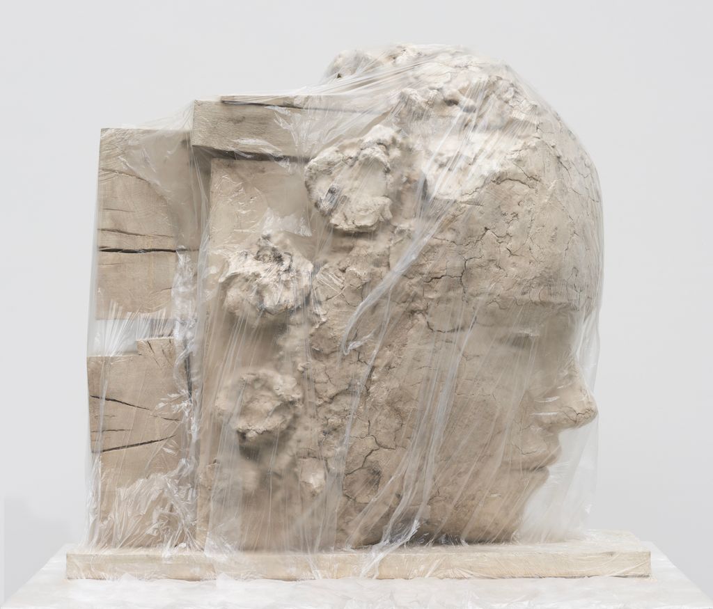 Image may contain Rock Plastic Wrap Adult Person and Wedding