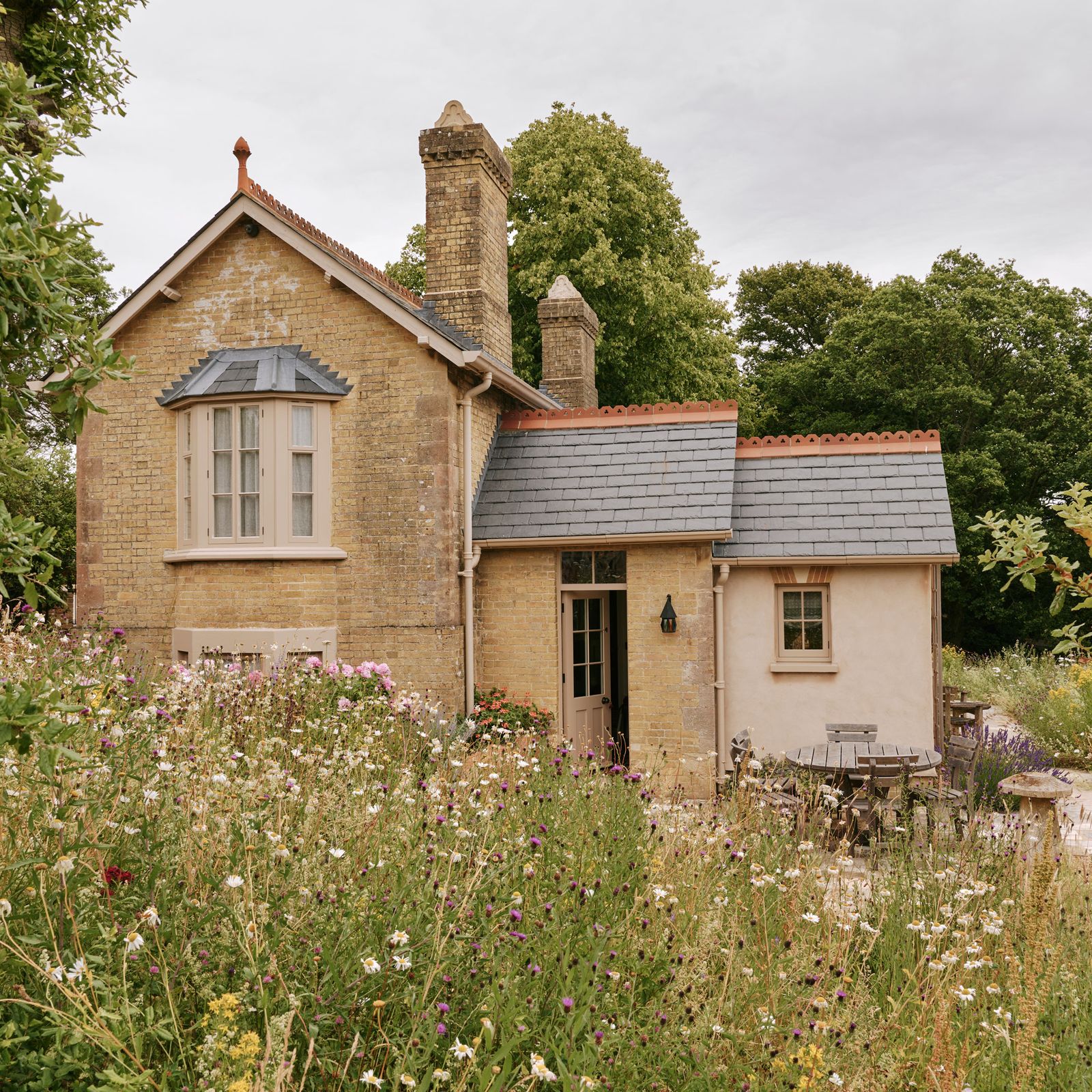 An inviting Hampshire cottage with a warm and layered interior by Max Rollitt