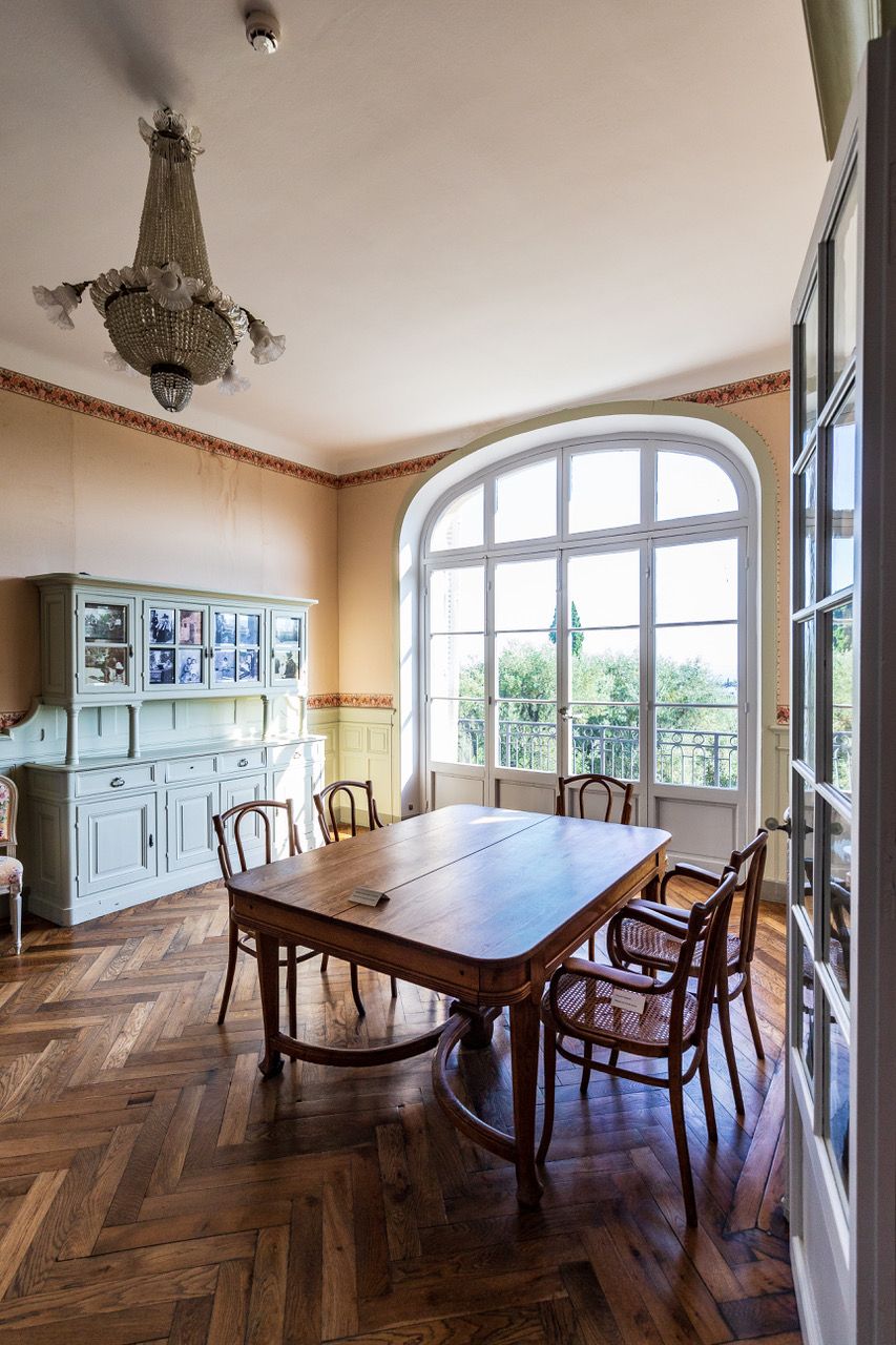 Image may contain Architecture Building Dining Room Dining Table Furniture Indoors Room Table and Chair