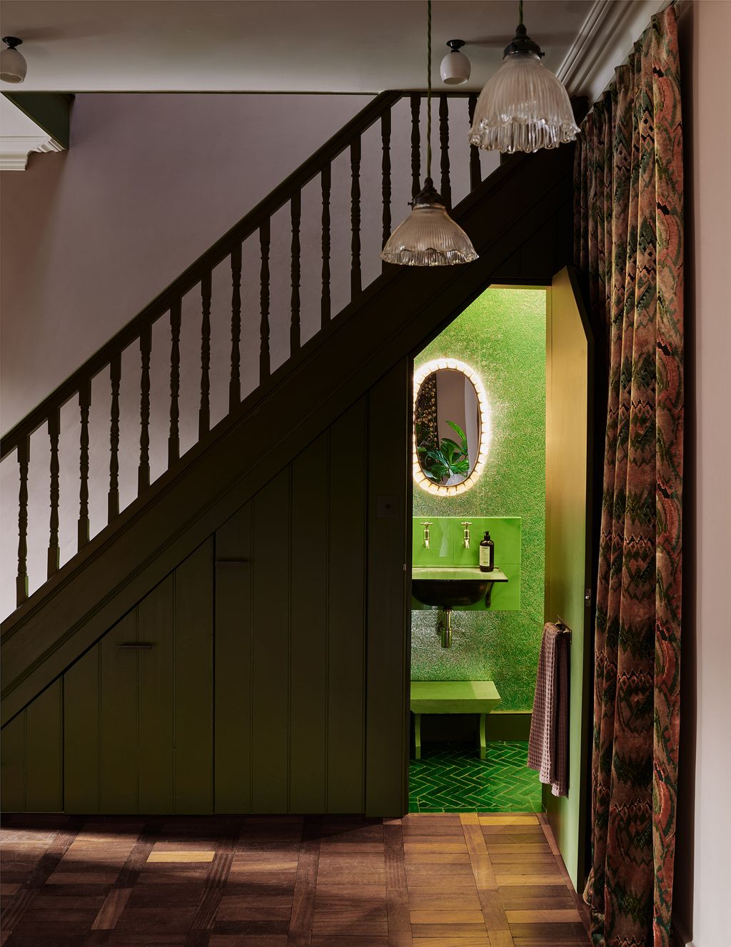 Like many of our favourite downstairs toilet ideas this space by Retrouvius is a jewelbox of a loo. An enamelled wash...
