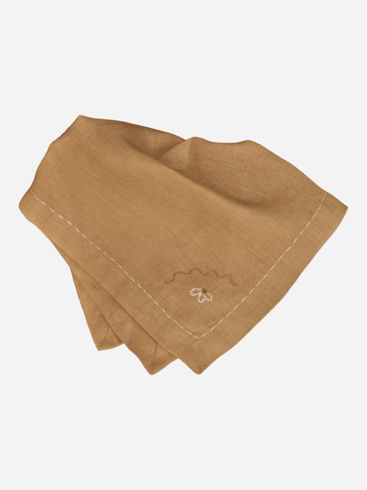 Image may contain Home Decor Linen and Napkin