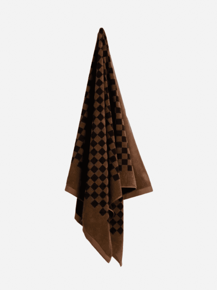Image may contain Towel Clothing and Coat