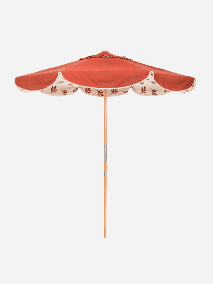 Image may contain: Architecture, Building, House, Housing, Patio, Canopy, Patio Umbrella, and Umbrella