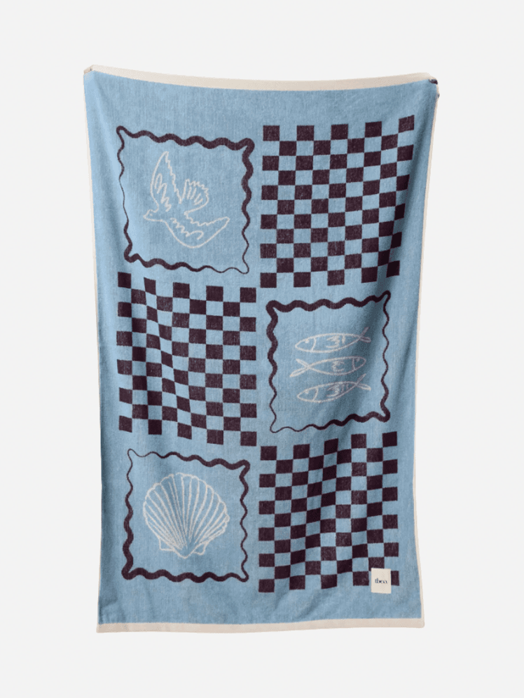 Image may contain Home Decor Blanket Quilt and Cushion