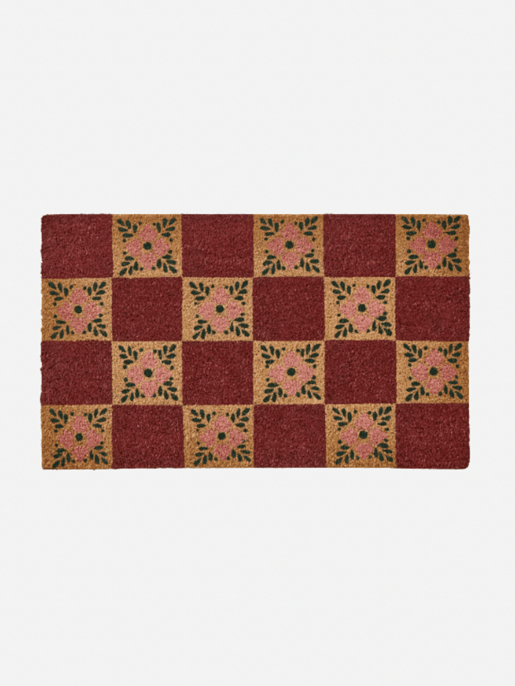 Image may contain Home Decor Mat Doormat and Rug