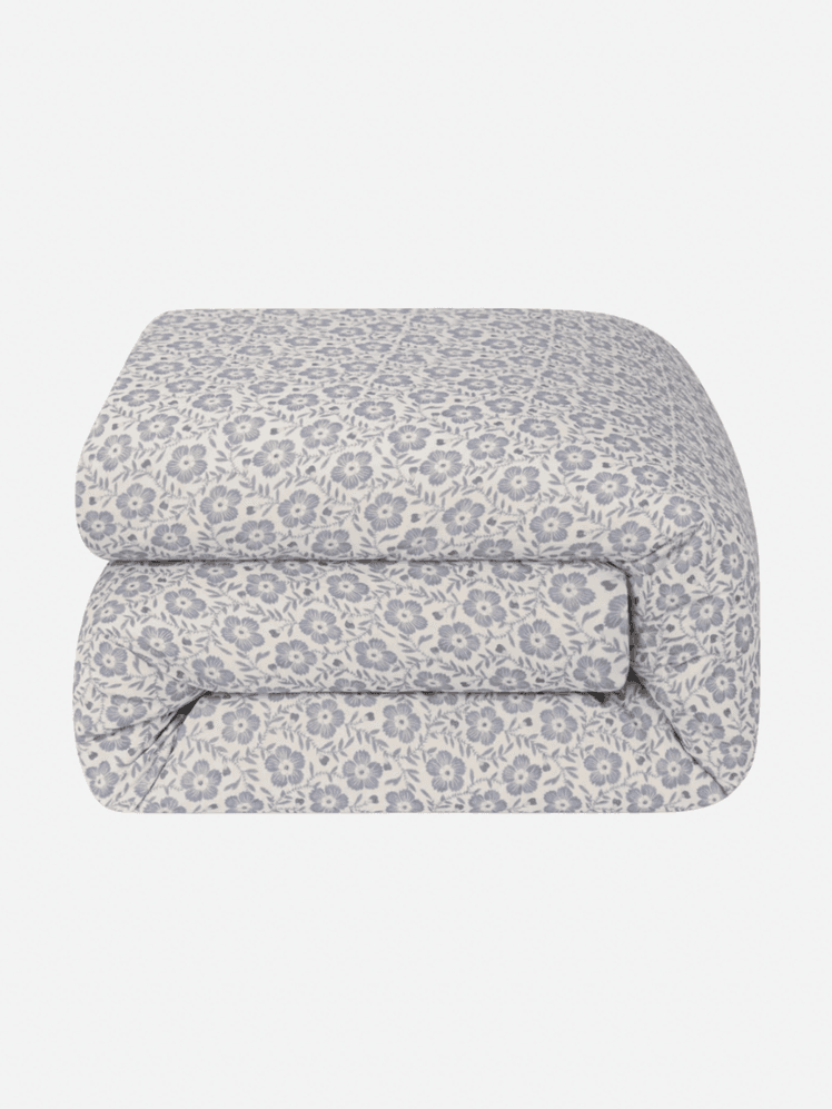 Image may contain Cushion Home Decor Blanket Furniture and Pillow