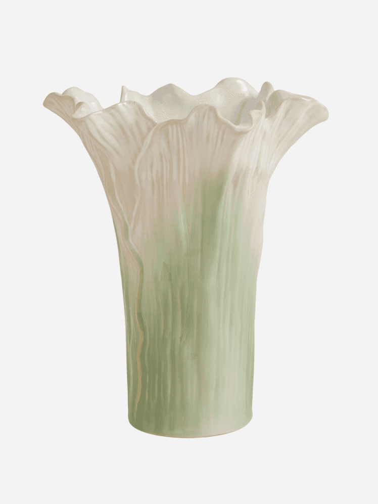 Image may contain Jar Pottery Vase Art Porcelain Blouse and Clothing