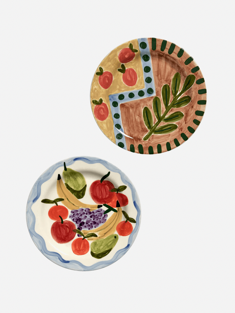 Image may contain Dish Food Meal Platter Food Presentation Plate Pottery Art Porcelain and Pattern