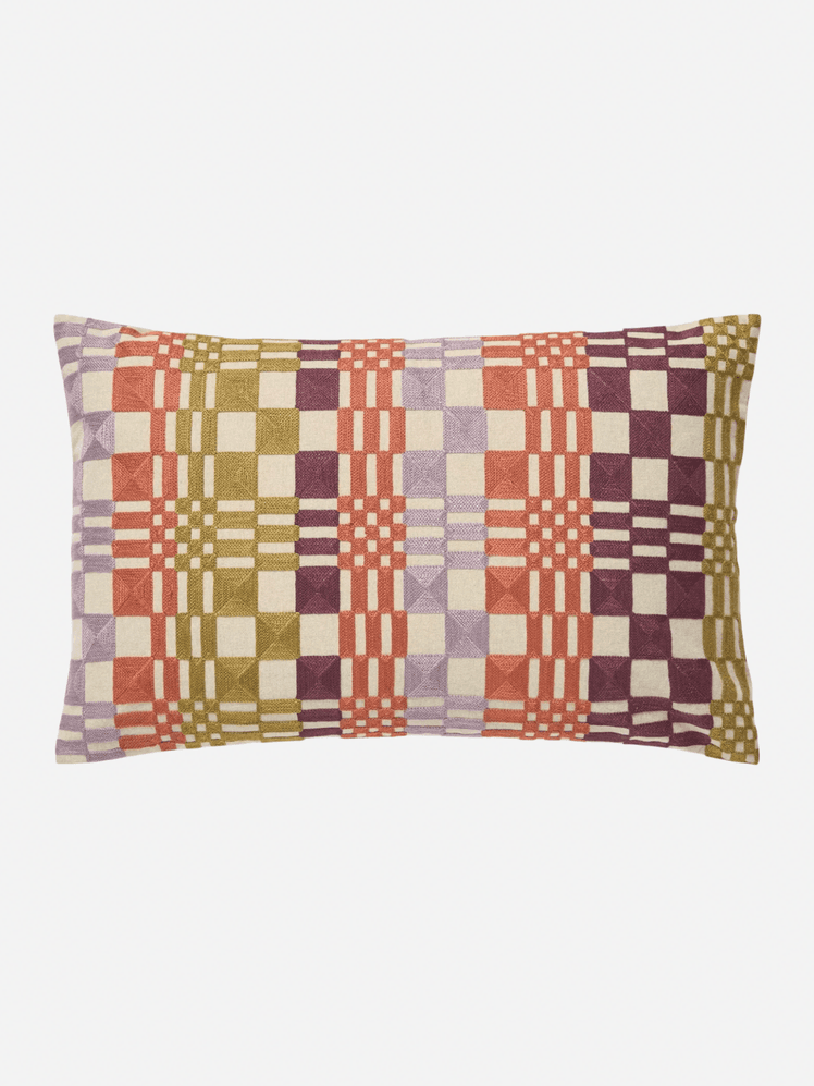 Image may contain Cushion Home Decor Pillow Clothing and Skirt