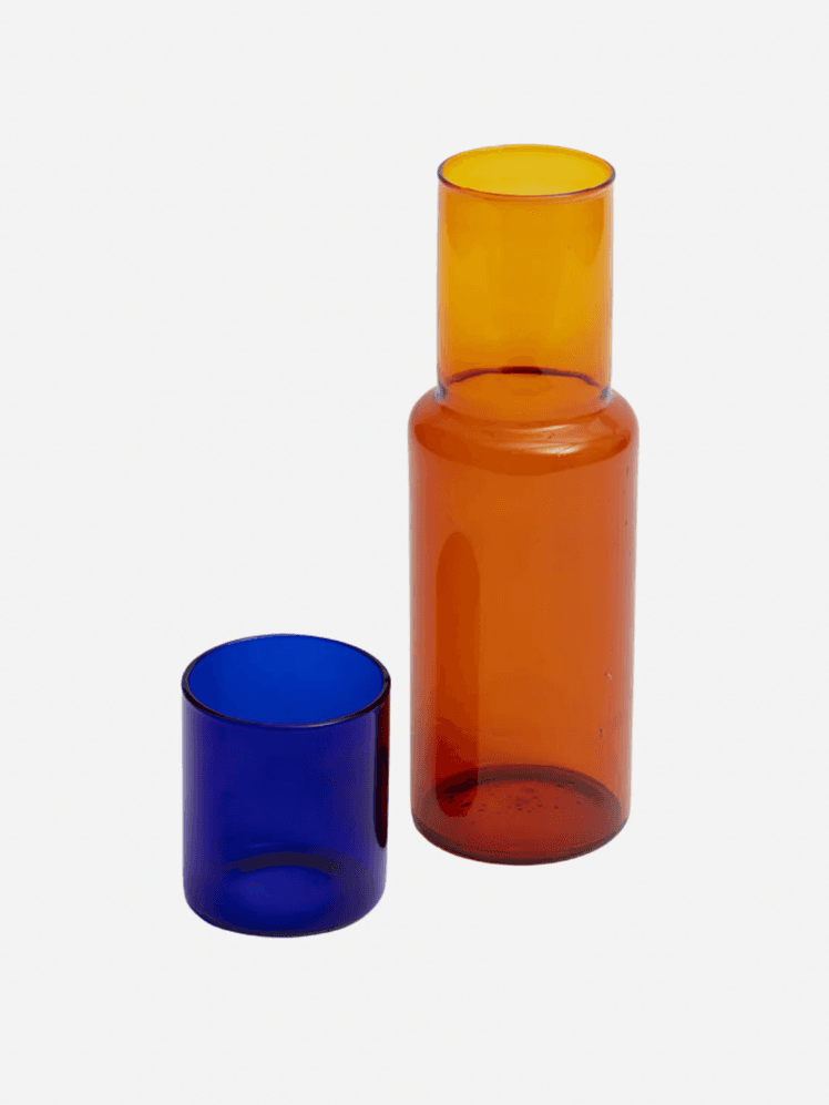 Image may contain Cylinder Glass Jar Bottle Cosmetics Perfume and Smoke Pipe