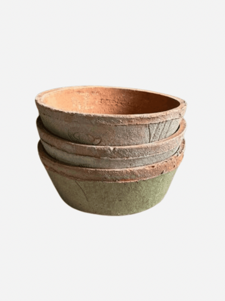 Image may contain: Bowl, Pottery, Soup Bowl, Cookware, Pot, and Tape