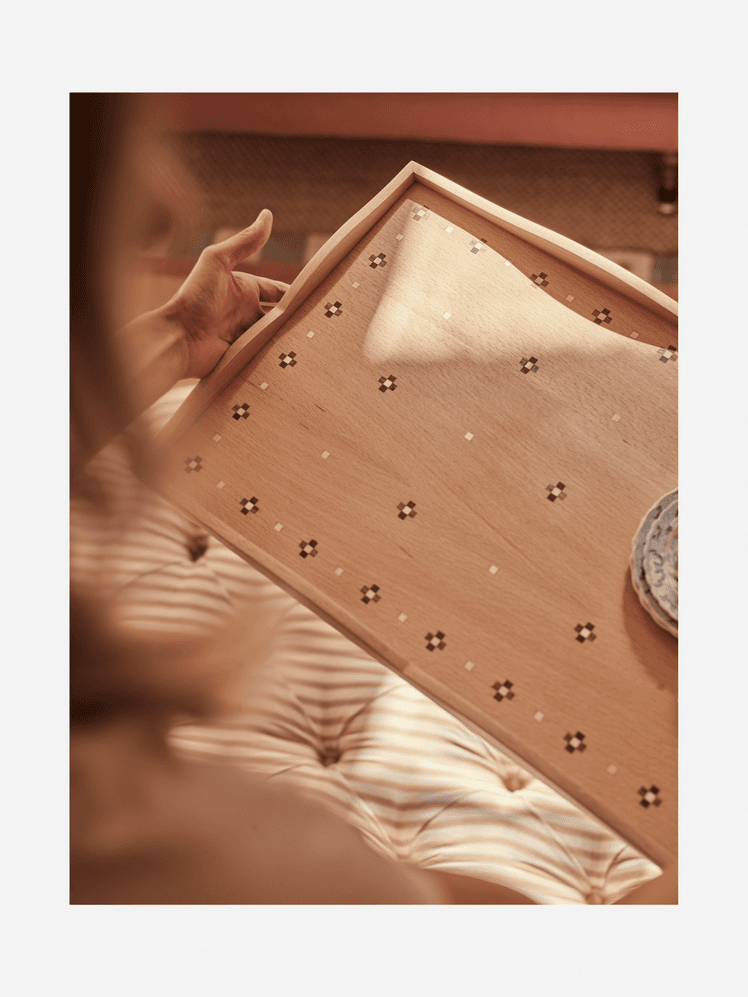 Image may contain Plywood Wood Indoors Interior Design Body Part Finger Hand Person and Baby